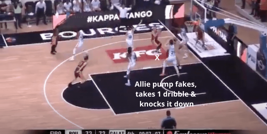 Allie pump fakes and takes a dribble and knocks the shot down through the defenders arm