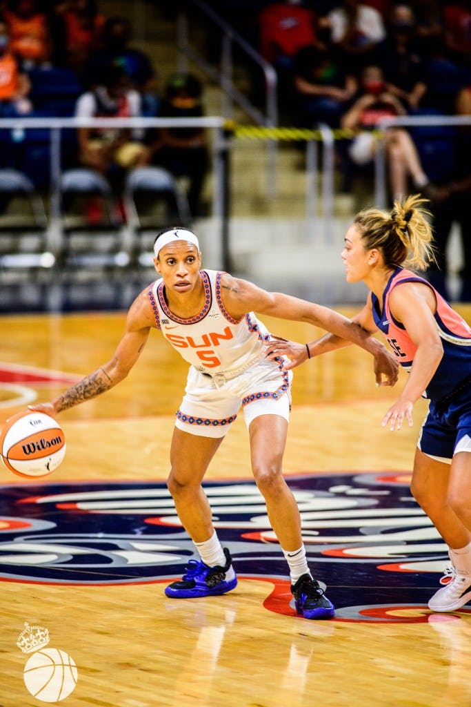 Connecticut Sun's Jasmine Thomas dribbles the ball against the Washington Mystics
