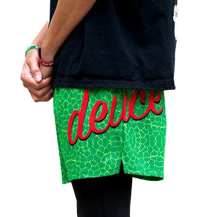 Deuce Grinch shorts for basketball from the side with Deuce logo script
